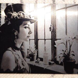 steampunk imagery on a black aluminum business card image